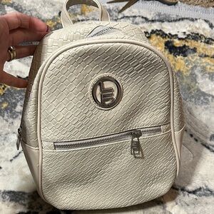 London Fog medium woven backpack in Geay/ Stone color
